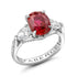 Platinum Oval Ruby Ring With Pear Shaped Diamonds